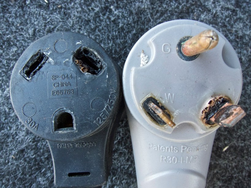 Damaged surge protector (left) and power cord (right)