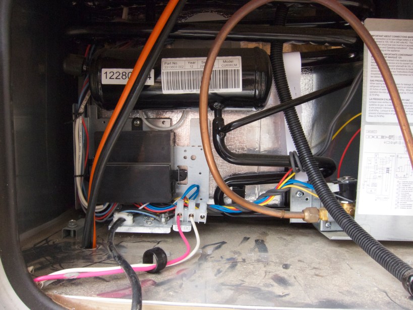 6/2 wire down the refrigerator vent;  will be routed forward to the battery box.