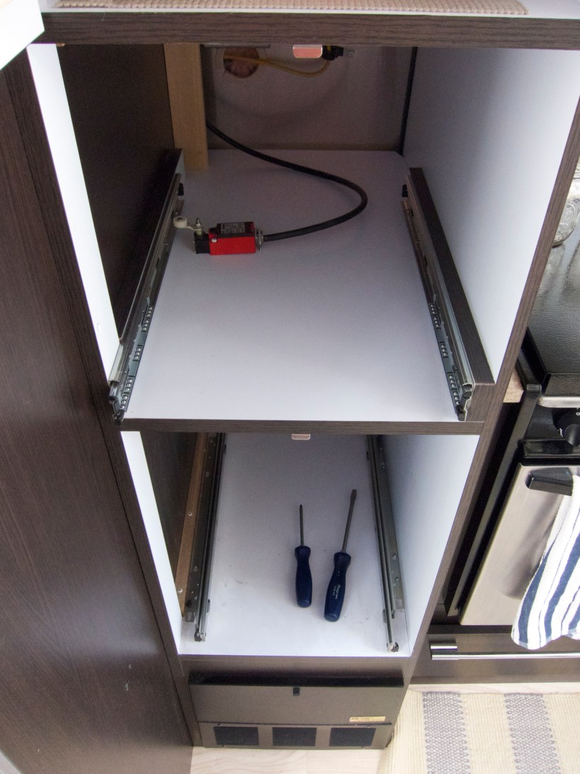 Pantry cabinets removed in order to run wires down to join the primary 6/2 wire