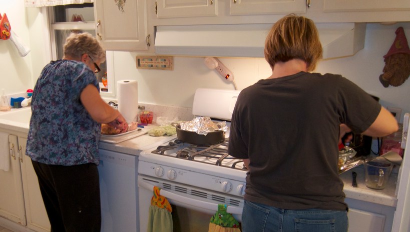 Kelly & Barb making final touches to dinner